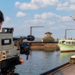 Weltanschauung Foto oder Film Kameramann filmt Schiff